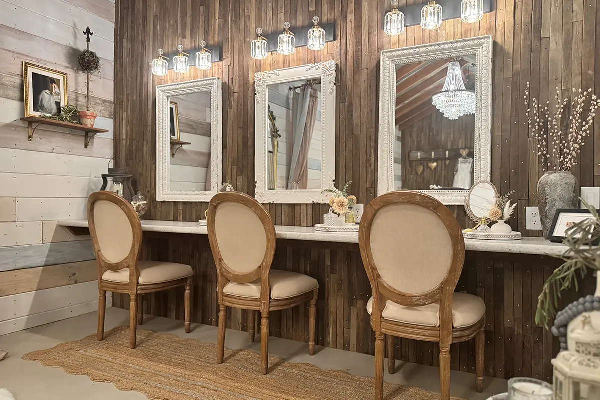 three chairs in front of mirrors