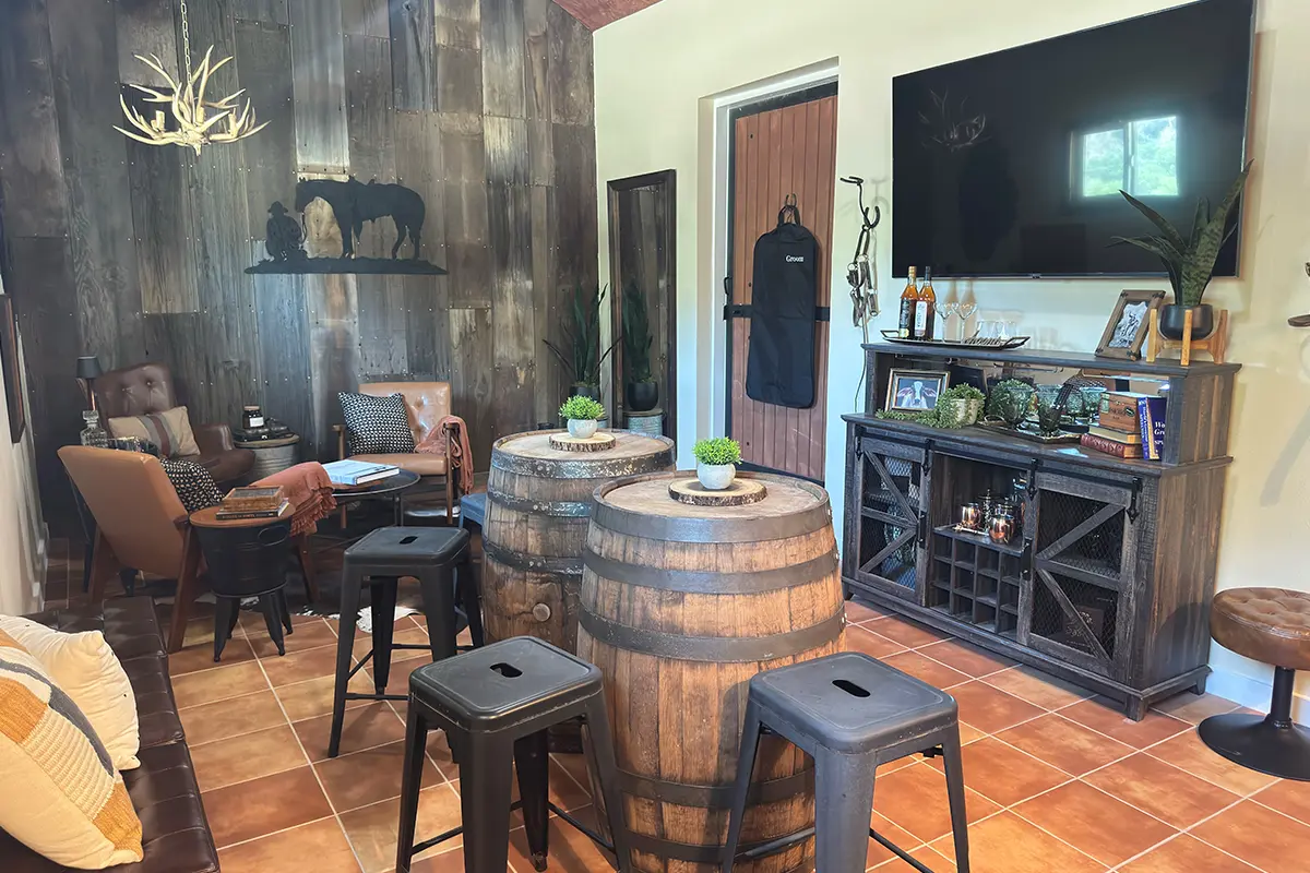 whiskey barrels and tv on the wall